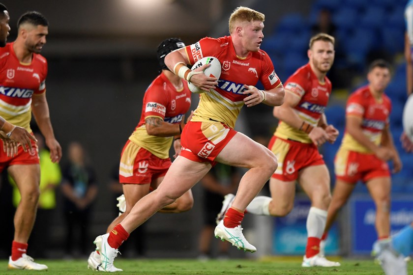 Thomas Flegler takes the ball up for the Dolphins.