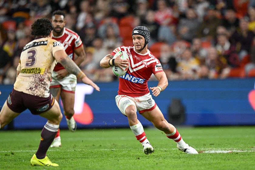 Kodi Nikorima with the ball for the Dolphins up against his former team the Broncos.