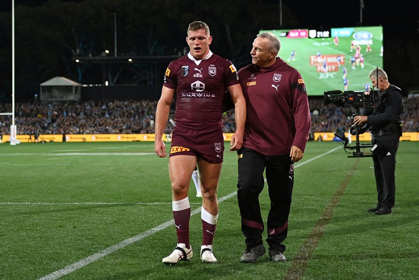 Tom Gilbert comes from the field in Game One of the 2023 Origin series with a season-ending shoulder injury.
