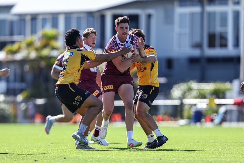 Maroons Trent Loiero and Harry Grant during their opposed training session against Sunshine Coast Falcons.