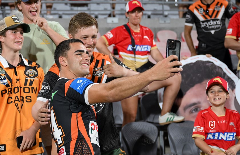 Tallyn da Silva poses with fans after the win over the Dolphins.