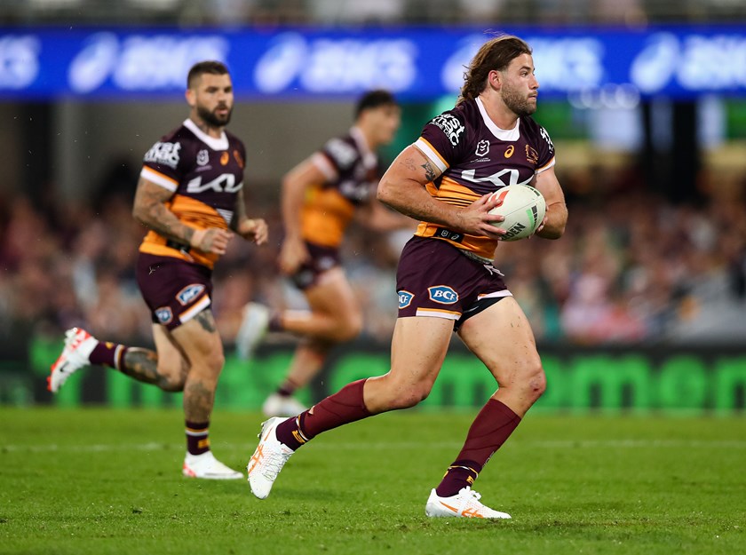 Pat Carrigan with the ball for the Broncos.