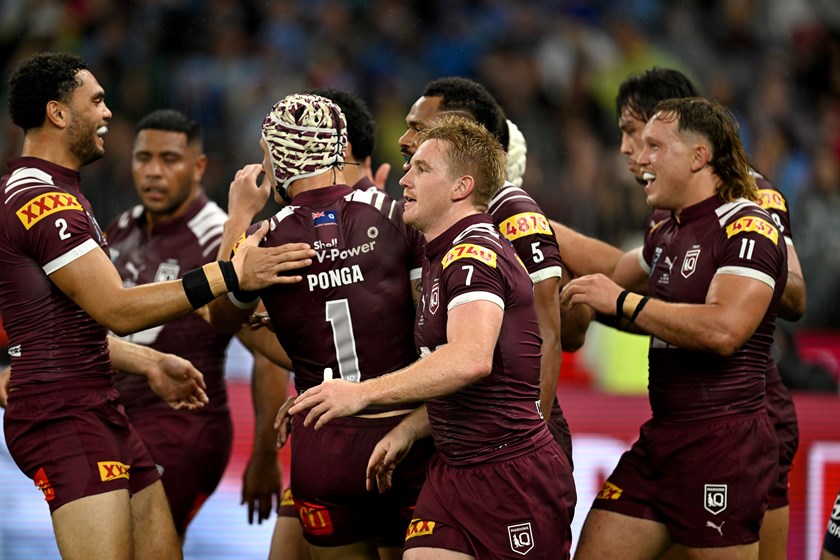 Tom Dearden celebrates with his team.
