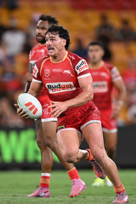 Herbie Farnworth with the ball for the Dolphins against the Titans.