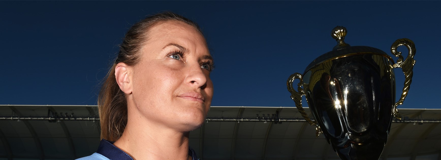 NSW women's star Ruan Sims with the Nellie Doherty Cup.