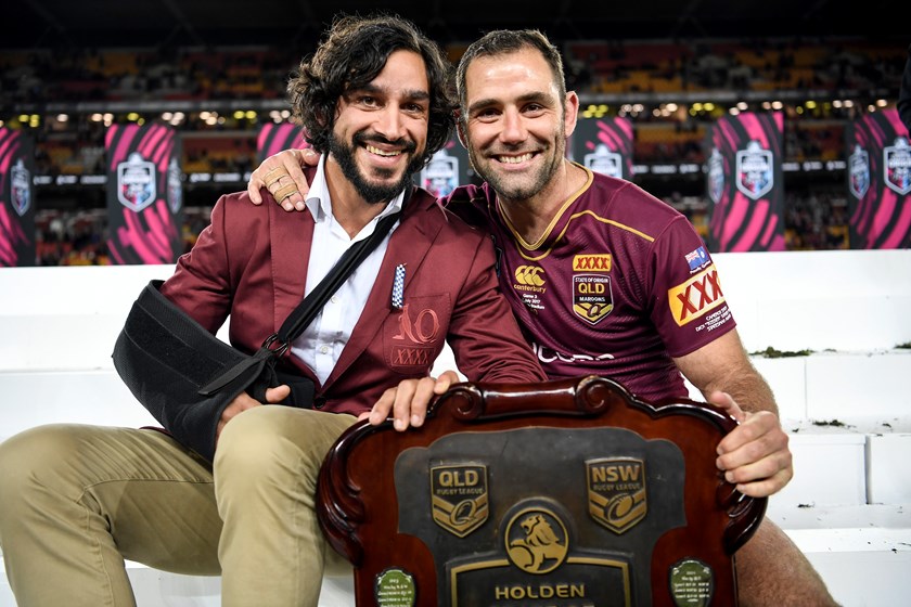 Johnathan Thurston and Cameron Smith celebrating QLD Origin win.
