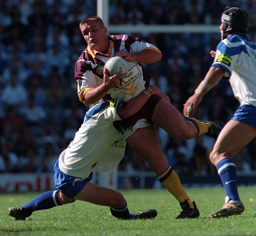 Shane Webcke takes a hit-up for the Broncos in the 1998 grand final win.