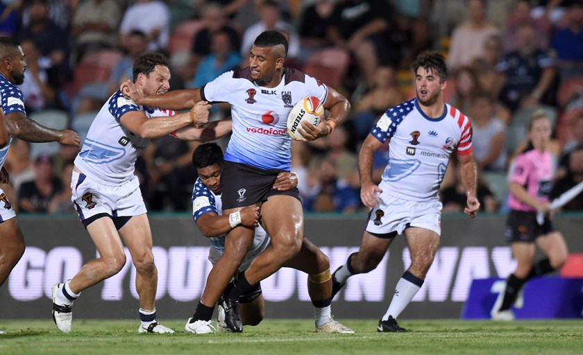Viliame Kikau represents Fiji against the USA.