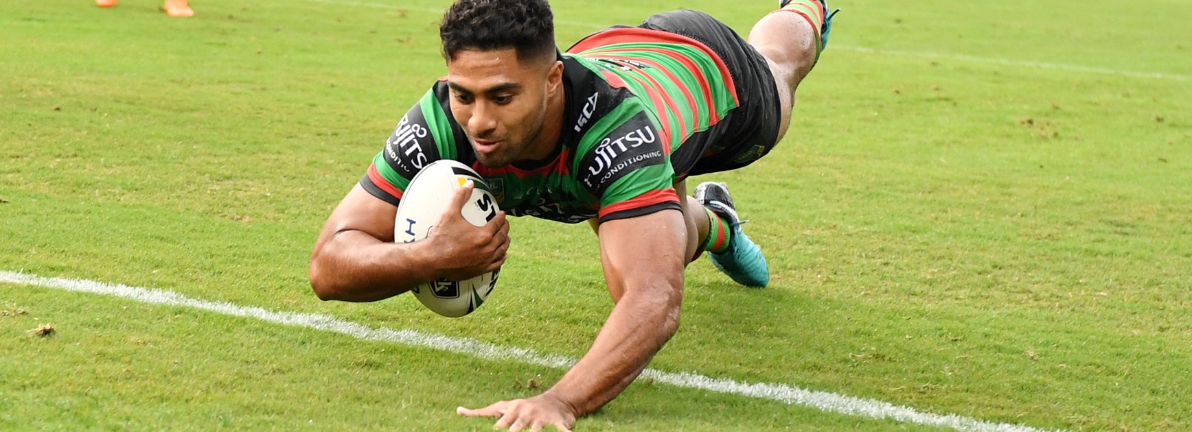 Rabbitohs winger Robert Jennings scores a try.