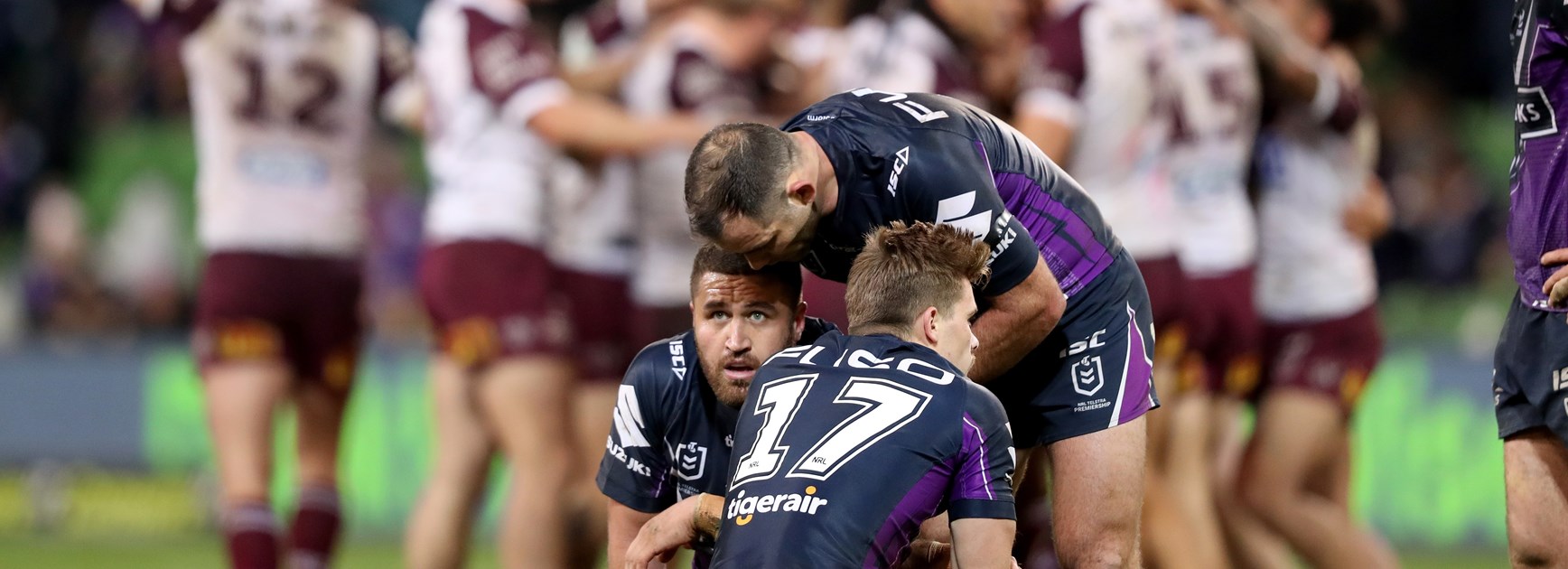 Melbourne players after their golden point loss to Manly.