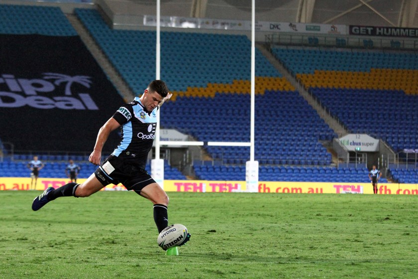 Chad Townsend taking a shot at goal.