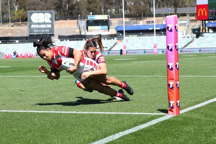 Tiana Penitani scores against the Roosters.