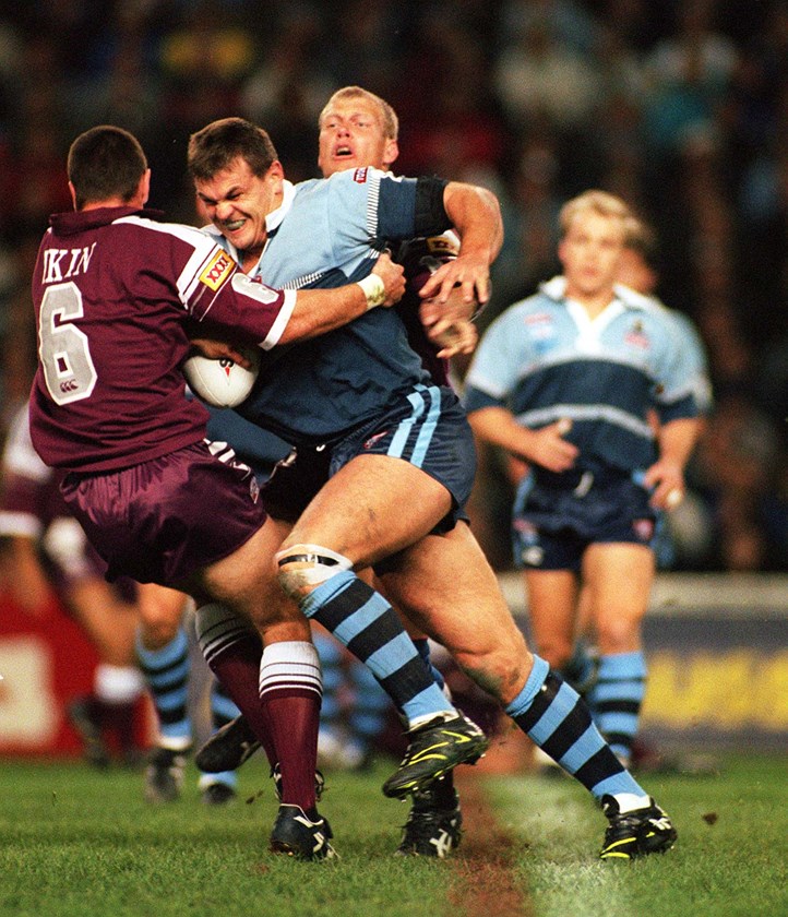 Harragon tries to steamroll Ben Ikin during an Origin clash in 1997.