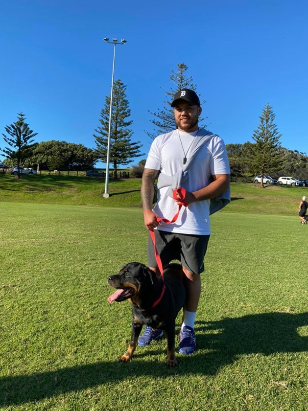 Jazz Tevaga takes rescue dog Xena for a stroll.