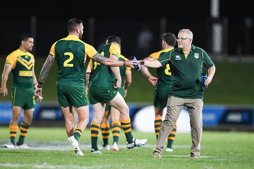 Prime Minister Scott Morrison running the water.