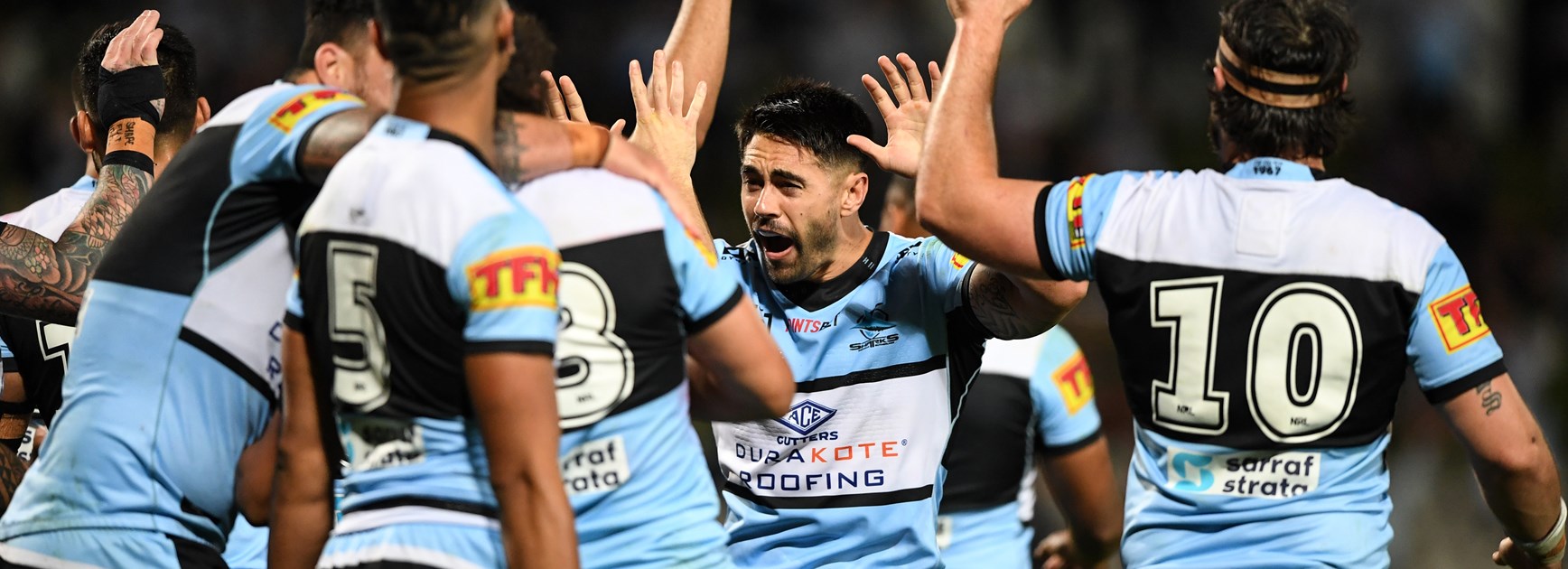 Shaun Johnson and Sharks teammates.