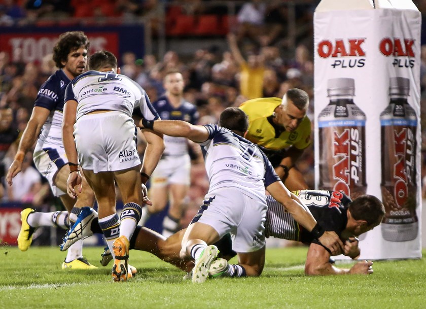 Isaah Yeo divers over for the Panthers.