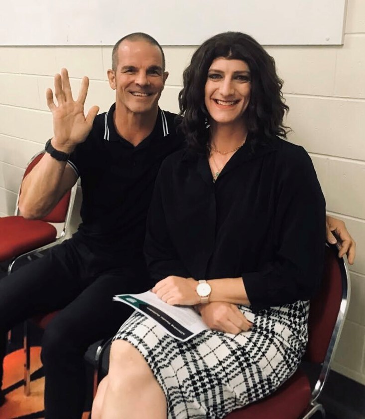 Holly Hazlewood with Blues and Kangaroos great Ian Roberts.