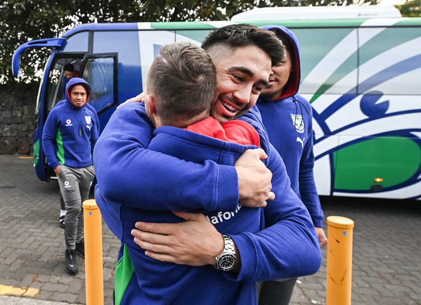 Shaun Johnson hugs Warriors fan Mark Dekker.
