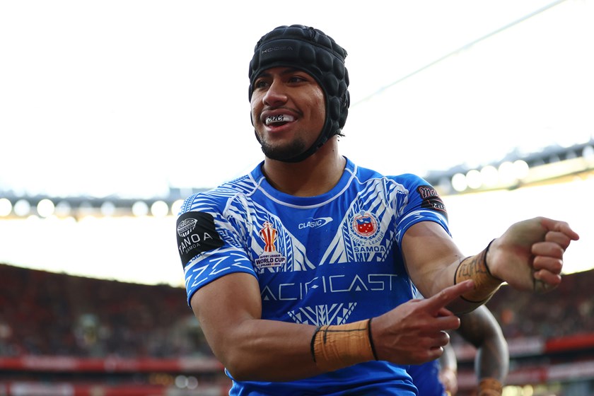 Stephen Crichton celebrates Samoa's stunning win over England.
