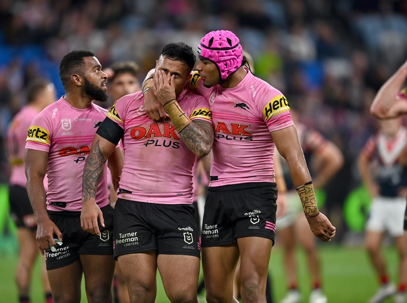 Spencer Leniu is escorted from the field by Panthers team-mates after being sinbinned for an altercation with Jared Waerea-Hargreaves
