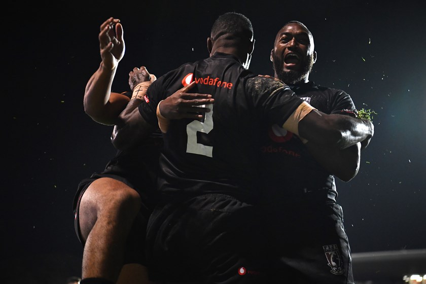 Isaac Lumelume celebrates a Bati try with Suliasi Vunivalu (No.2) in 2019.