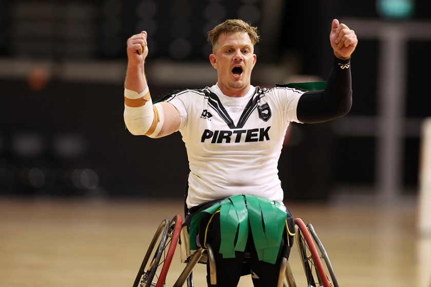 Dan Scott celebrates a Wheel Kiwis' try against the Wheelaroos