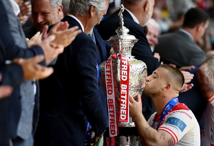 Hull KR match winner Mikey Lewis kisses the Challenge Cup trophy after steering the Robins to an 8-6 defeat of Warrington at Wembley.