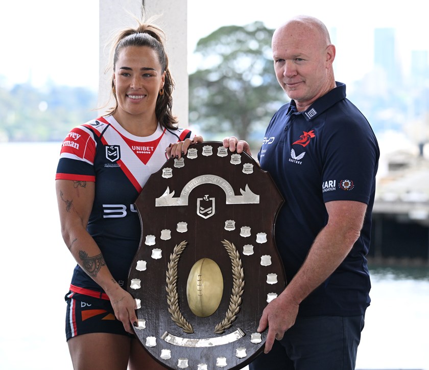 Sydney Roosters captain Isabelle Kelly and coach John Strange with the Nellie Doherty Shield.
