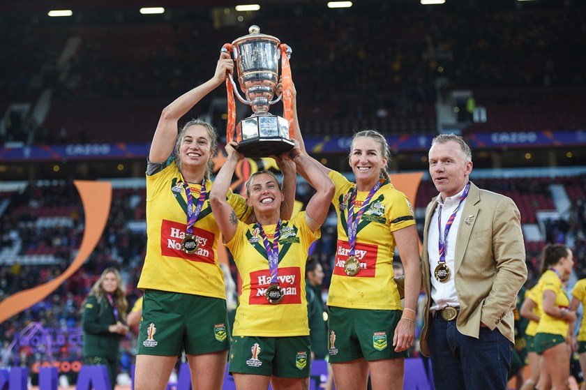 Brad Donald with Jillaroos captains Kezie Apps, Sam Brember and Ali Brigginshaw after winning the 2022 World Cup at Old Trafford.