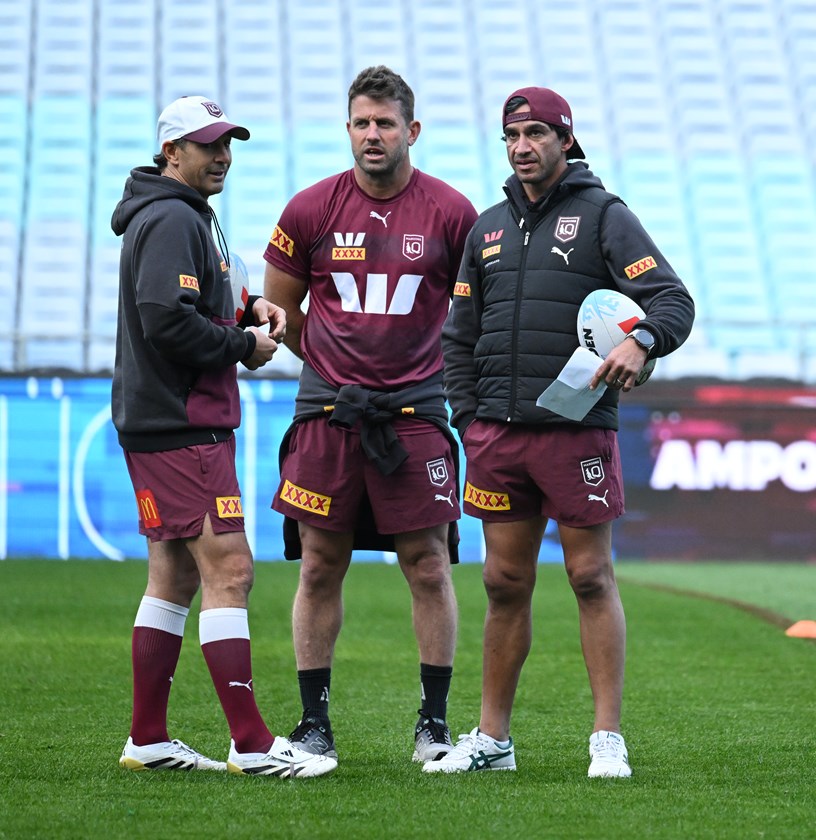 "There's no textbook for this": Maroons coach Billy Slater with assistants Josh Hannay and Johnathan Thurston welcome Cameron Munster's return at their Origin III captain's run.