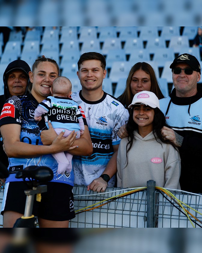 Caitlan Johnston-Green with daughter Amarah and family members after making her return in Indigenous Round for the Sharks.