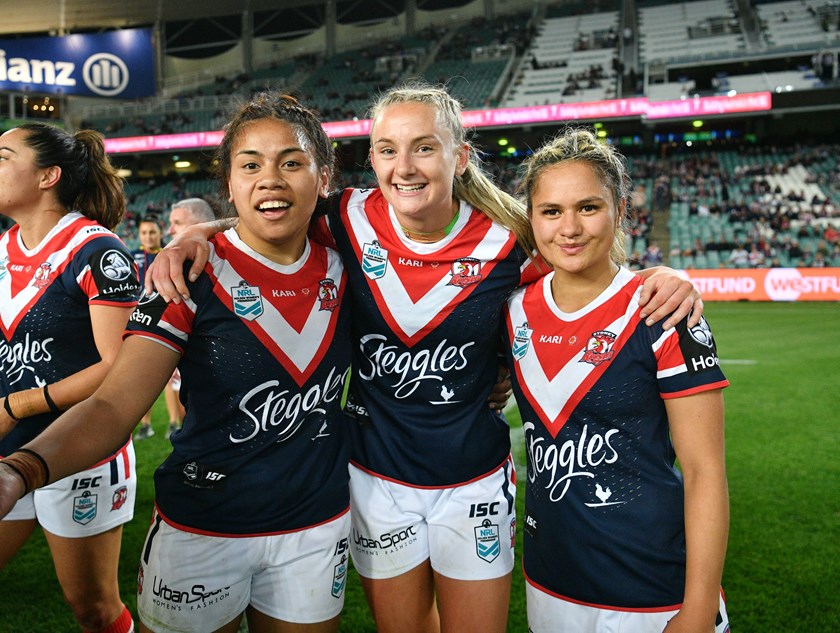 Brydie Parker celebrates her NRLW debut in 2018 with Sarah Togatuki and Nita Maynard-Perrin.