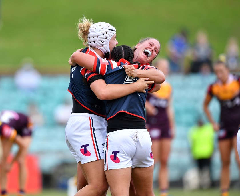 Hannah Southwell, Raecene McGregor and Tayla Predebon  celebrate the Roosters semi-final defeat of Brisbane in 2021.