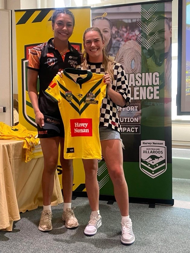 Ana Malupo presents Jakiya Whitfeld with her Jillaroos jersey in Las Vegas.
