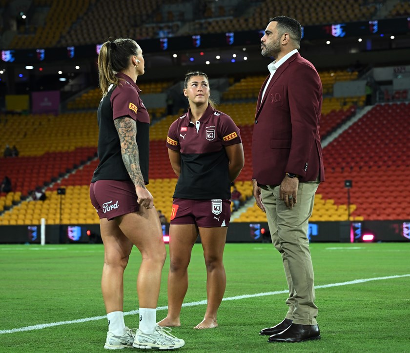 Jada Ferguson, Julia Robinson and Greg Inglis chat on field after the Maroons arrival at Suncorp Stadium.