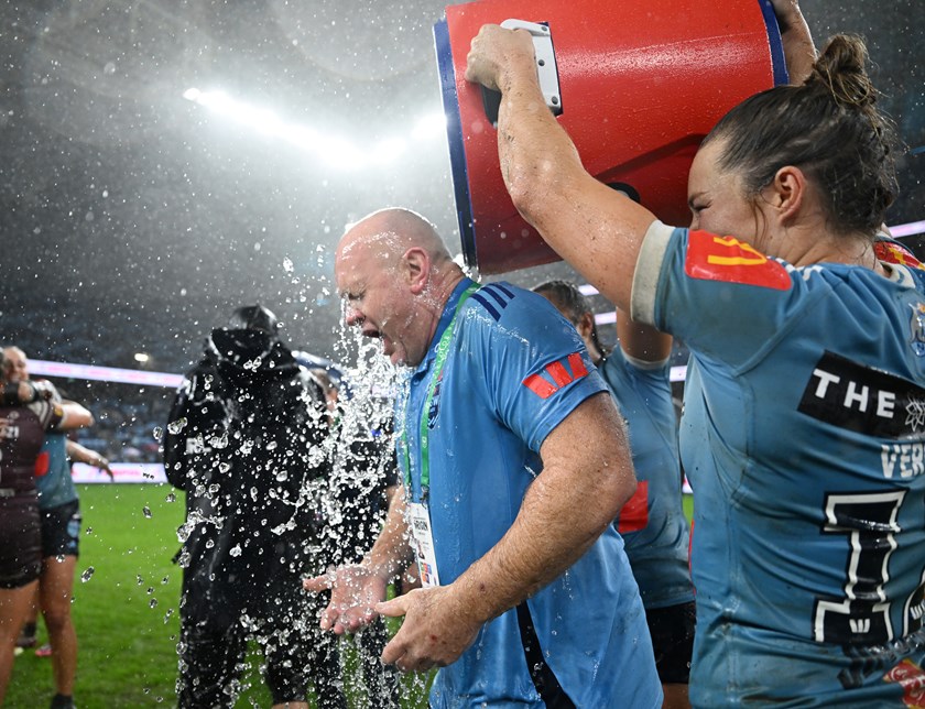 Blues players credit coach John Strange for creating a bond within the Origin series winning team.