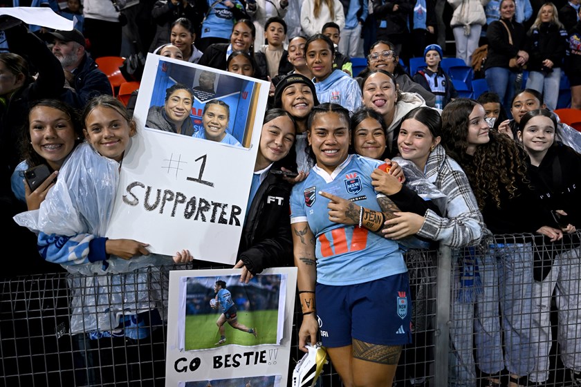 NSW Blues  forward Sarah Togatuki with family members at fulltime after playing in honour of sister in Origin III at McDonald Jones Stadium.