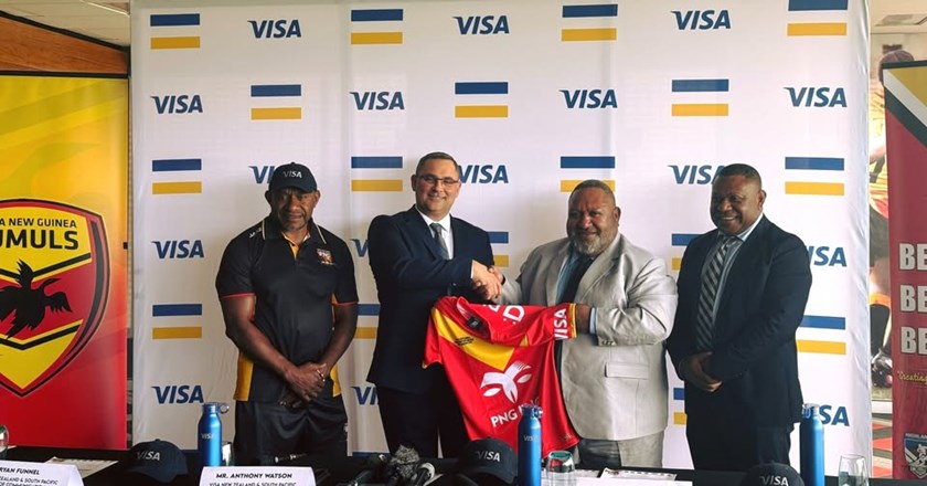 PNGRFL chairman PNGRFL chairman Sandis Tsaka and Visa's Anthony Watson show the Kumuls jersey with the Visa logo on the sleeve.
