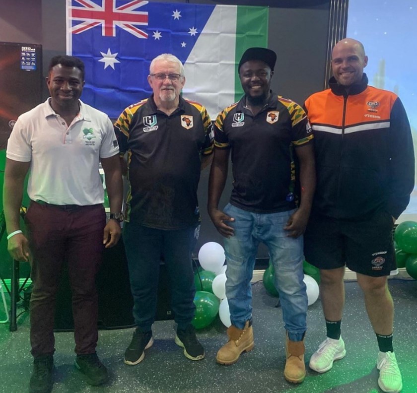 Nigerian coach Bolu Fagborun (l) and assistant coach Luke Shearman (r) with Africa United founder Steve Warwick and sponsor Daniel Abetik.