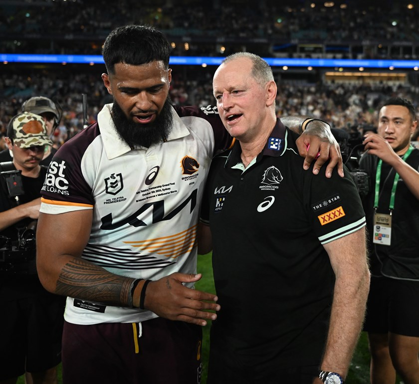 Payne Haas and Michael Maguire celebrate last year's grand final win against the Storm.
