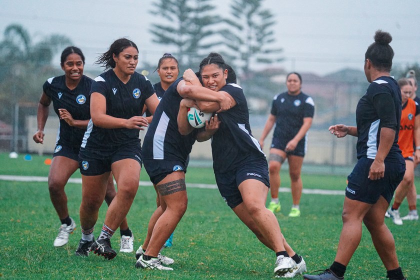 Eels young gun Mareva Swann is tackled at training 